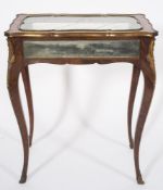 A 19th Century French kingwood, brass and gilt metal mounted bijouterie display table:,