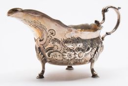 A George III silver sauce boat, maker John Langlands I, Newcastle, 1774: crested,