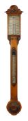 Lilley & Sons, London, a carved oak stick barometer: the bone dial aslant for 10 A.M.