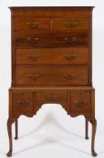 An Edwardian mahogany chest on stand: in the Georgian taste,