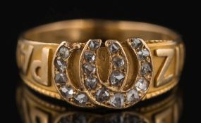 A Victorian gold and rose diamond 'Mizpah' ring: with rose diamond mounted double horseshoe motif