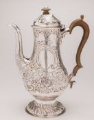 A Victorian silver coffee pot, maker SB possibly Susannah Brasted, London, 1891: crested,