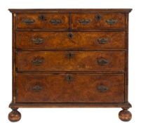 An early 18th Century walnut, inlaid and cross and feather banded rectangular chest:,