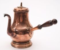 A late 18th century copper chocolate pot: of baluster form:,