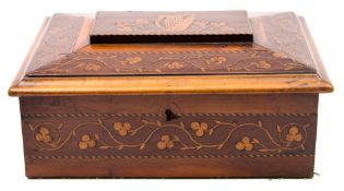 A 19th century Killarney arbutus marquetry box: the shallow domed hinged top inlaid with an Irish