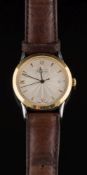 A gentleman's 'Asprey Automatic' gold plated and stainless steel wristwatch: the engine-turned