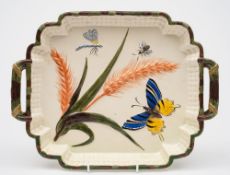 A George Jones majolica bread tray: of shaped rectangular form modelled in low relief with ears of