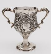 A George III Irish silver two-handled cup, maker Matthew West, Dublin, 1790: crested,