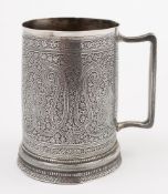 A 19th century Indian silver mug: of conical shape with all-over designs of botehs and flowerheads,