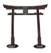 A Japanese miniature bronze Torri (entrance gate): of traditional design,