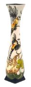 A Moorcroft pottery vase: of slender form with square foot and rim tubelined in The Chase pattern