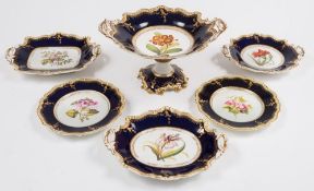 A John Ridgway porcelain botanical part dessert service: each piece painted to the centre with a