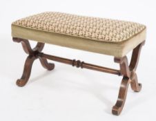 A Victorian walnut curved X-frame stool:, with a rectangular upholstered stuff over woolwork seat,