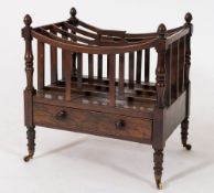 An early 19th century rosewood four division canterbury: with carved and slatted divisions,
