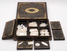 A 19th century Chinese lacquer gaming box: the lift-off lid enclosing five lidded boxes,