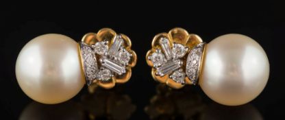 A pair of cultured pearl and diamond ear studs: each with a single cultured pearl 12.