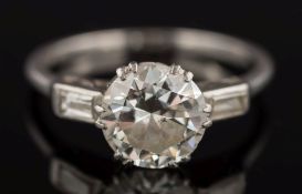 A diamond solitaire ring: the circular, brilliant-cut diamond 8mm wide x 4.