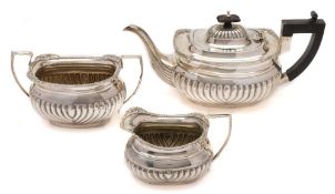 An Edward VII silver three-piece tea service, maker Thomas Hayes, Birmingham,