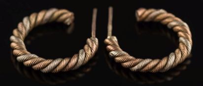 A pair of 9ct gold two colour hoop earrings:, 5.5gms gross weight.