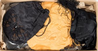 An early 20th century black silk evening scarf, three evening bags and a small collection of lace:.