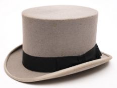 A black felt top hat by Tress& Co, London: ,size 7 1/2, together with a grey top hat by Dunn& Co,