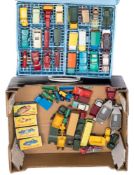 A collection of Lesney/Matchbox 1-75 series vehicles in a collectors case and loose:,