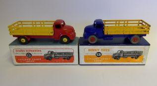 Dinky, No 531 Leyland Comet Lorry: dark blue body, yellow back and red grooved hubs,
