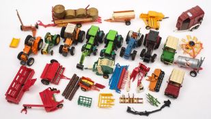 A collection of various farming vehicles by Britains, Ertel and other makers:,