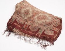 A Victorian printed cotton shawl,: with geometric decoration, label to box '...