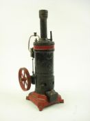 An early 20th century tinplate vertical steam plant by Bing,Germany:, maker's mark to furnace door,