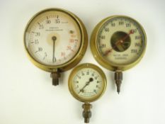 A 7 inch brass bulkhead Combined Pressure and Vacuum gauge by J Tomey & Sons, Birmingham,
