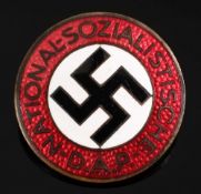 An NSDAP enamel lapel badge by Karl Wild, Hamburg:, of typical form stamped RZM M1/92, 2.