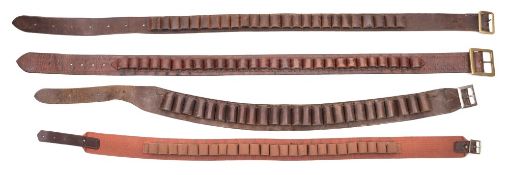 Three leather cartridge belts and a canvas cartridge belt:.