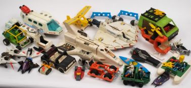 A collection of Fisher Price 'Alpha probe' space vehicles and other Fisher Price vehicles and