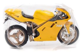 Maisto, a collection of diecast motorbikes: contained in bubble packs with plastic stands.