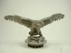 An early 20th century nickel plated Eagle car mascot:, unsigned, with outstretched wings,