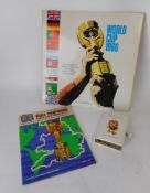 A 1966 World Cup programme: a World Cup 1966 33rpm record and a World Cup Willie money box.