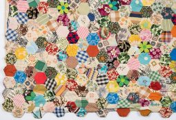 Two 20th century patchwork quilts:, both with geometric decoration,