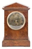 An oak cased RAF mantel clock by F W Elliot Ltd:,