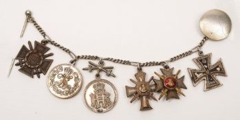 A group of six German Empire WWI miniature medals:, Iron Cross, Albert Cross,
