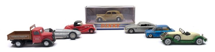 A collection of various cars and commercial vehicles:, including a Dinky Fire Engine (555),