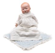 An Armand Marseille bisque head baby doll:, with moulded hair, blue glass eyes,
