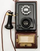 Amid -20th century Western Electric hotel or apartment wall telephone:,