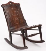 A late 19th century child's bentwood rocking chair:,