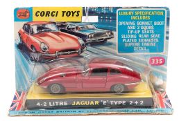 Corgi No.335 Jaguar E-Type:, red body , black interior with wire wheels in bubble pack.