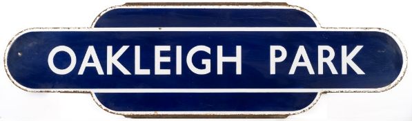 A British Rail (Eastern) railway totem sign for Oakleigh Park:, white text on blue ground,