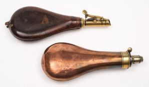A leather and brass shot flask with embossed game decoration and a copper and brass powder flask:,