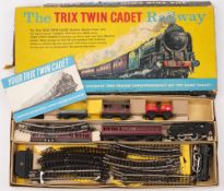 A Trix Twin Cadet Railway set (incomplete) together with a Hornby Mersey Railways Class 142 Pacer,