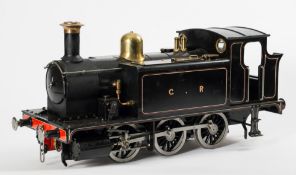 A three and a half inch gauge live steam 0-6-0 tank locomotive in C R black livery: fitted with