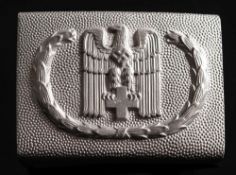 An NSDAP Red Cross belt buckle 1938 pattern:,